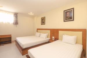 Postel nebo postele na pokoji v ubytování Song Anh 3 Hotel