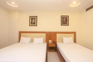 Postel nebo postele na pokoji v ubytování Song Anh 3 Hotel