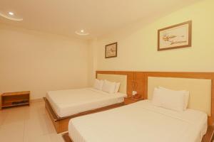 Postel nebo postele na pokoji v ubytování Song Anh 3 Hotel