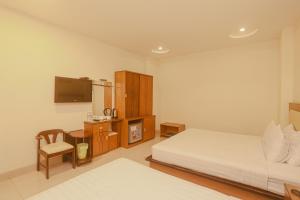 Postel nebo postele na pokoji v ubytování Song Anh 3 Hotel