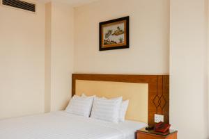 Postel nebo postele na pokoji v ubytování Song Anh 3 Hotel