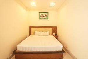 Postel nebo postele na pokoji v ubytování Song Anh 3 Hotel