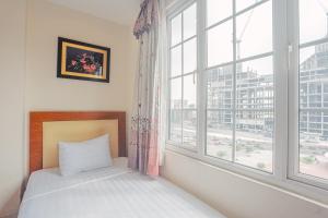 Giường trong phòng chung tại Song Anh 3 Hotel