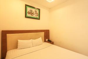 Postel nebo postele na pokoji v ubytování Song Anh 3 Hotel