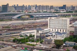 an aerial view of a large city with buildings at Best Western Chatuchak in Bangkok