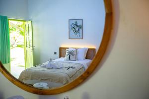 La Roja Bungalows客房内的一张或多张床位