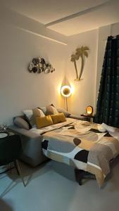 a bedroom with a large bed with pillows at Studio NICE CENTRE sur Avenue Jean Medecin MER à 8 minutes de marche in Nice