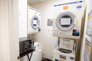 a laboratory with two machines in a room at le Lac HOTEL KUSATSU in Kusatsu +6 photos