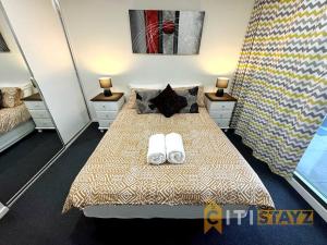 Fancy in Phillip - 2bd 2bth Apt!客房内的一张或多张床位