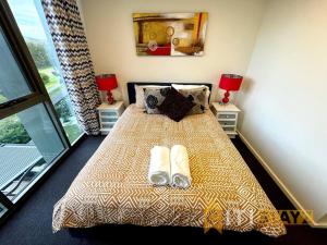 Fancy in Phillip - 2bd 2bth Apt!客房内的一张或多张床位