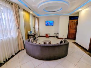 TV a/nebo společenská místnost v ubytování Melili Hotel