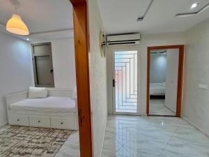 Postel nebo postele na pokoji v ubytování A3 Luxe and Cosy Apartement 10 min de Hay Riad + 1 fotografie