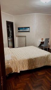 Säng eller sängar i ett rum på Hotel Sirio