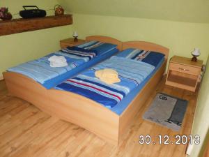 Postel nebo postele na pokoji v ubytování Gästehaus Auhagen