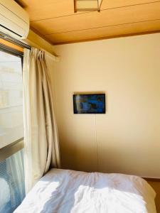 Postel nebo postele na pokoji v ubytování 糖果屋