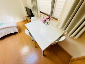 Postel nebo postele na pokoji v ubytování 糖果屋