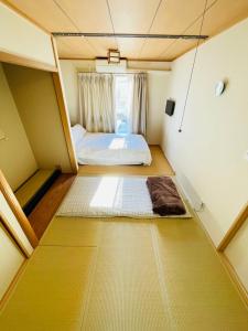 Postel nebo postele na pokoji v ubytování 糖果屋