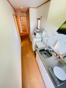 TV a/nebo společenská místnost v ubytování 糖果屋