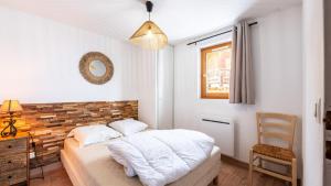 Posteľ alebo postele v izbe v ubytovaní Les Grizzlis - 29 - Appart confort - 8 pers