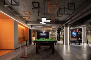 a billiard room with a pool table in it at Changsha Desti Youth Park Hostel in Changsha