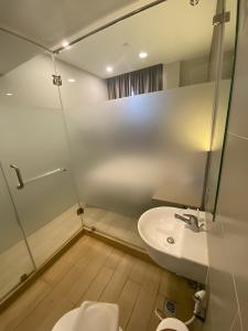Ένα μπάνιο στο Swasana Hotel Medan