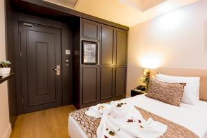 Postel nebo postele na pokoji v ubytování Antusa Design Hotel & Spa