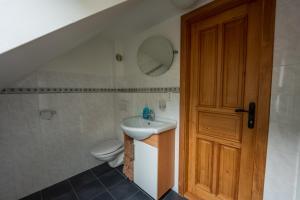 Koupelna v ubytování Apartmány U Gášků