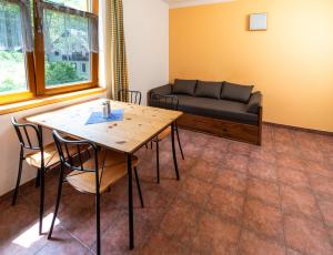 Posezení v ubytování Apartmány U Gášků