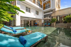 Bazén v ubytování Royal Riverside Hoi An Hotel & Spa nebo v jeho okolí
