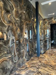 Koupelna v ubytování Arka Art Hotel