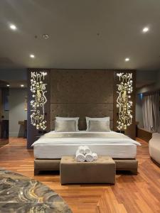 Ένα ή περισσότερα κρεβάτια σε δωμάτιο στο Arka Art Hotel