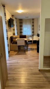 Зона вітальні в Gösser BACHGASSLHOF -- Bed and Breakfast -- Apartments