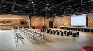 a lecture hall with chairs and a screen at Camping Lanterna Premium Resort - Vacansoleil Maeva in Poreč