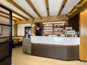 Lounge nebo bar v ubytování Hotel Locanda Alla Perla