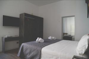 Postel nebo postele na pokoji v ubytování T rooms