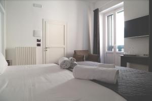 Postel nebo postele na pokoji v ubytování T rooms