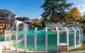 a water park with a water slide and a fountain at Appartamento Eden Tuscany in Casciana Terme