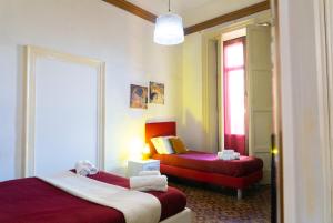 Posteľ alebo postele v izbe v ubytovaní B&B Opera