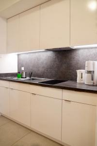 Kuchyňa alebo kuchynka v ubytovaní Prima by Baltic Home