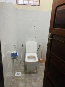 Een badkamer bij Rafiki Guest House
