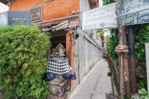 a fire hydrant on the side of a street at Green View Ubud Hostel Bali in Ubud