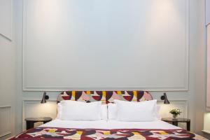 Posteľ alebo postele v izbe v ubytovaní Casa Romana Hotel Boutique