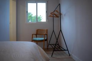 Postel nebo postele na pokoji v ubytování La Siesta Hostel