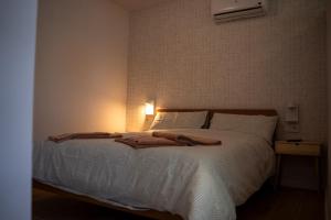 Postel nebo postele na pokoji v ubytování La Siesta Hostel
