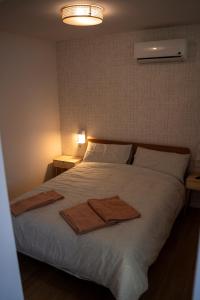 Postel nebo postele na pokoji v ubytování La Siesta Hostel