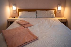 Postel nebo postele na pokoji v ubytování La Siesta Hostel