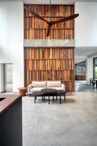 a living room with a couch and a table at Taprobane House in Colombo