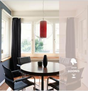 Wohnen in Wiedikon Adonis في زيورخ: غرفة طعام مع طاولة وكراسي ونافذة