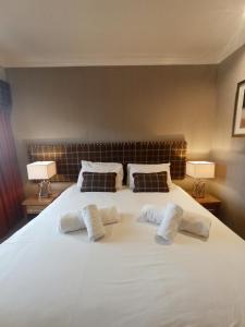 Letto o letti in una camera di Anchor Hotel and Seabed Restaurant