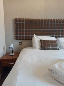 Letto o letti in una camera di Anchor Hotel and Seabed Restaurant